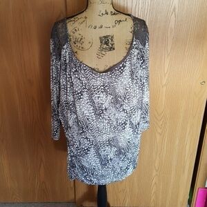 Maurices size 4 top. Black animal print with lace.
